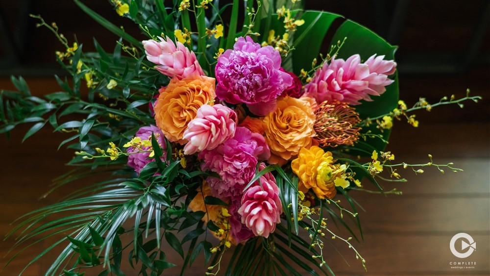 Bright Colorful Flowers at Christine and Joe's Captivating Tropical Wedding at Palmetto Riverside Bed and Breakfast