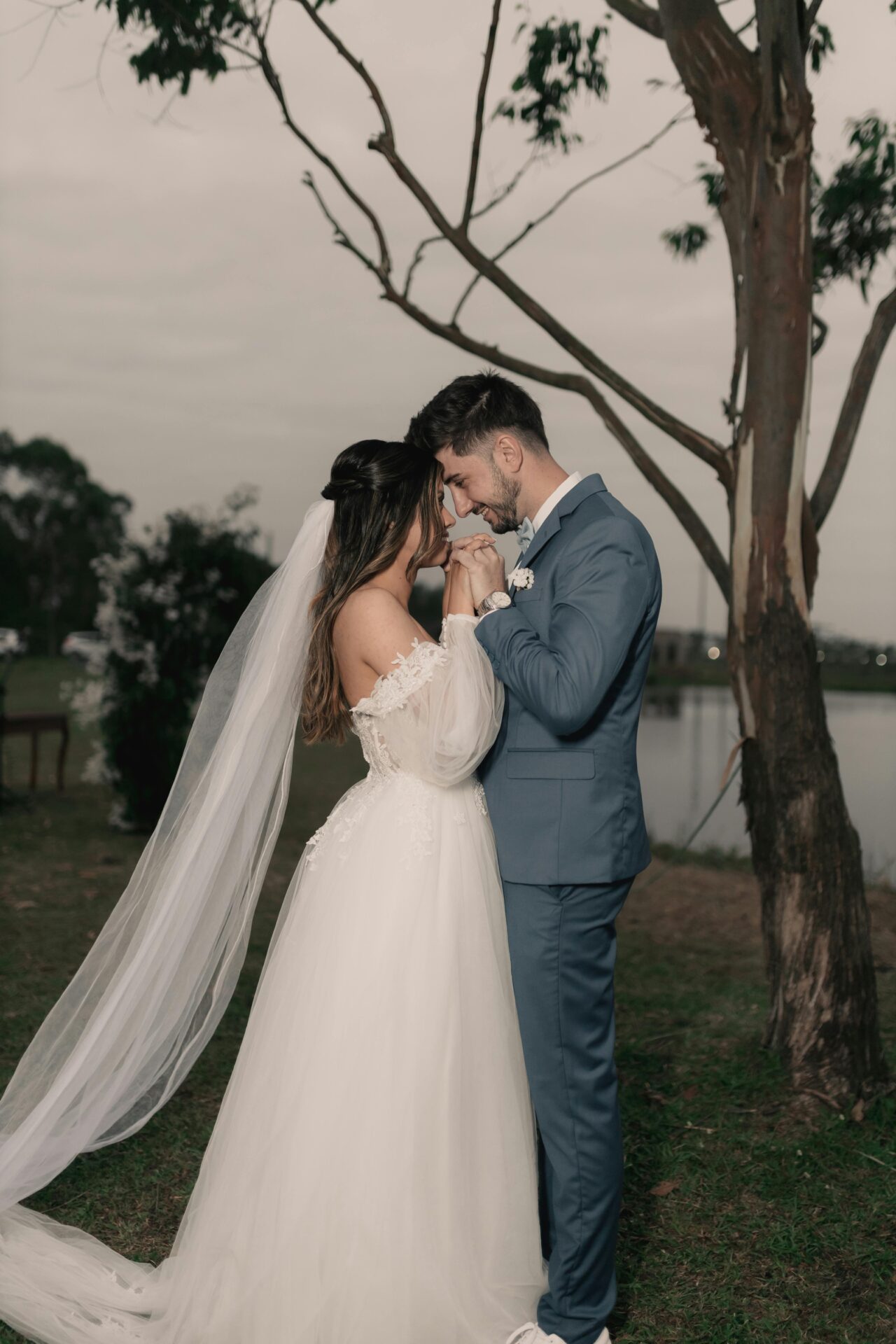 Newlyweds embrace for Sarasota Seasonal Wedding Photography