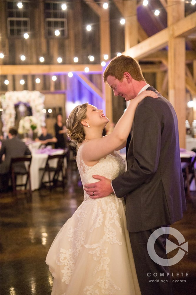 Sycamore Creek Family Ranch Bride and Groom First Dance with Twinkle Lights in Background