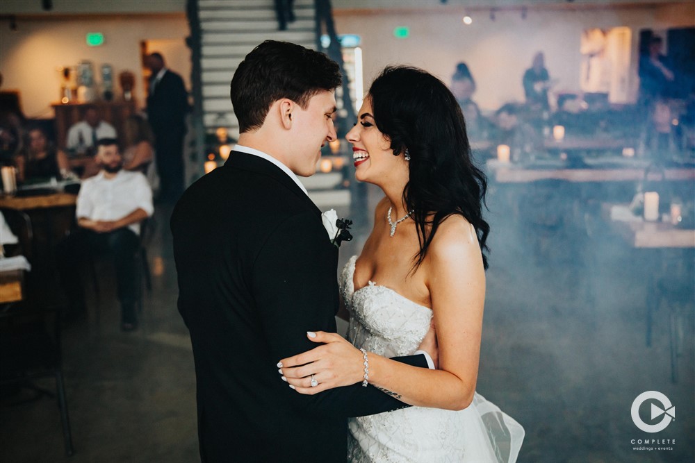 Bride and Groom first dance during wedding reception at The Atrium Wedding and Event Center