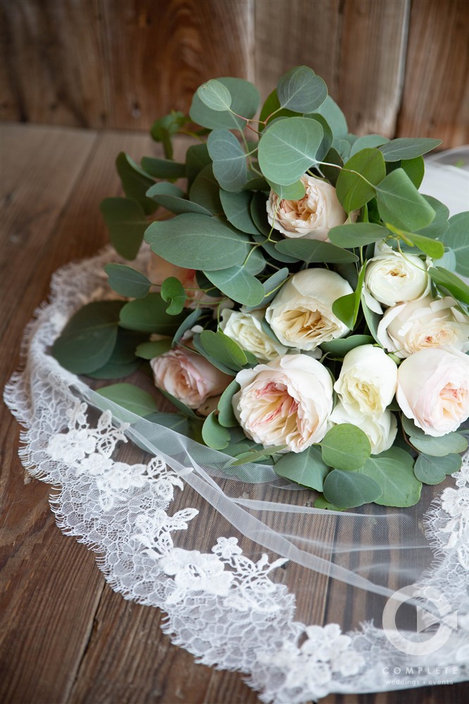 wedding bouquet white roses and lace