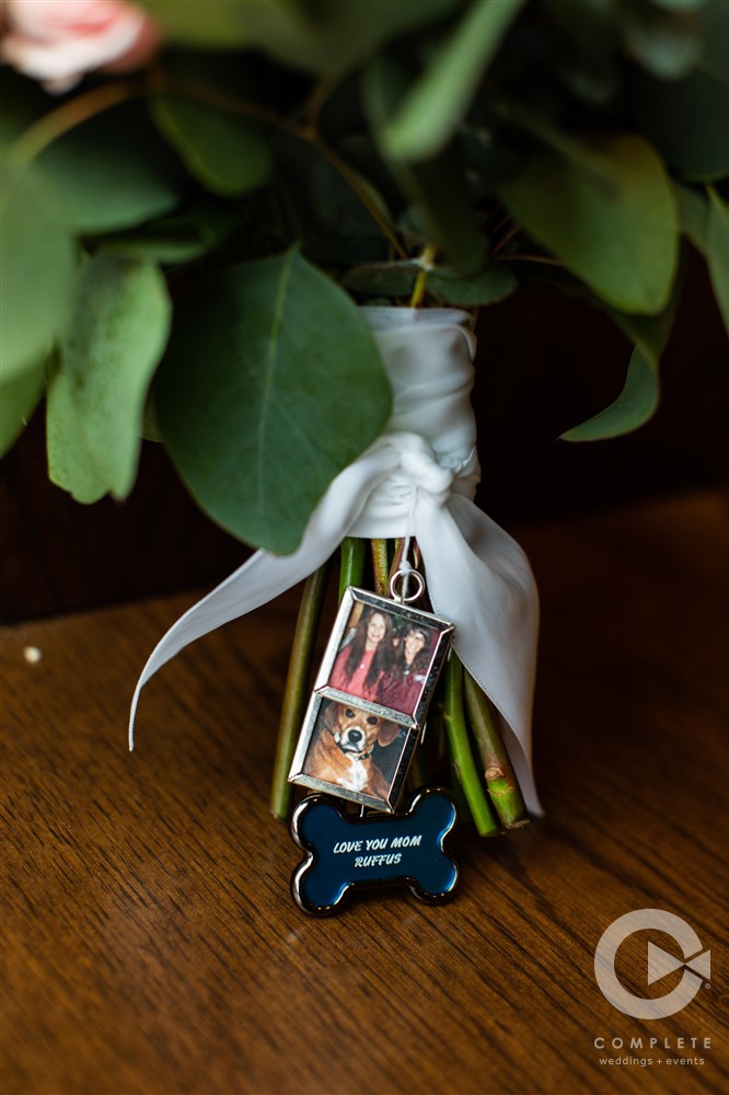 memorial pictures and dog tag on bouquet