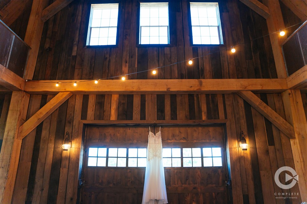 back doors and wedding dress in barn