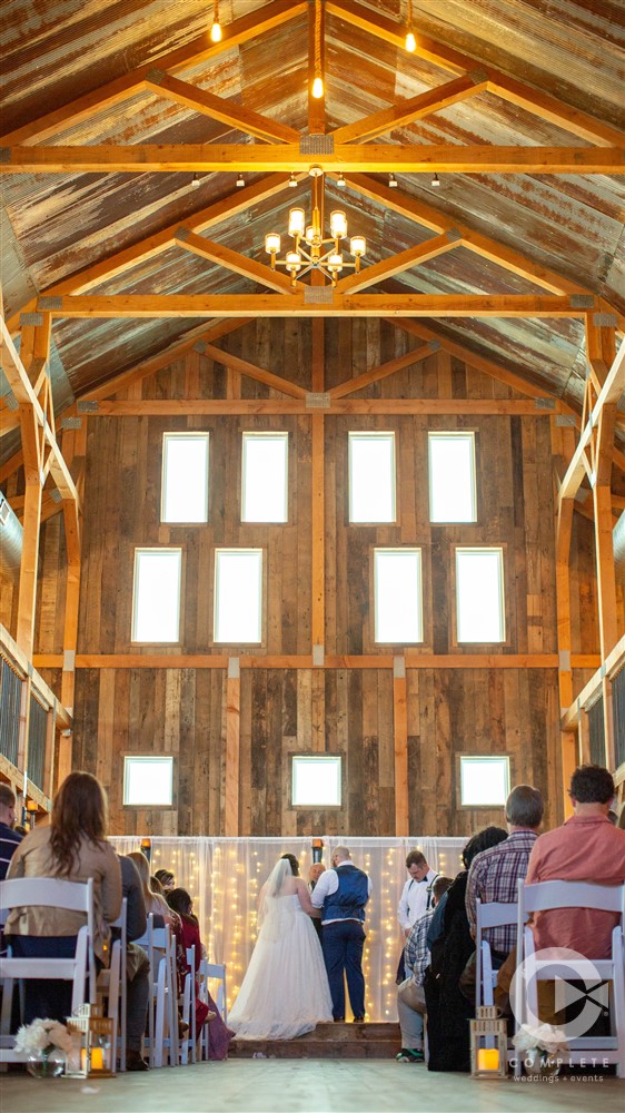 Indoor ceremony at the Gambrel Barn