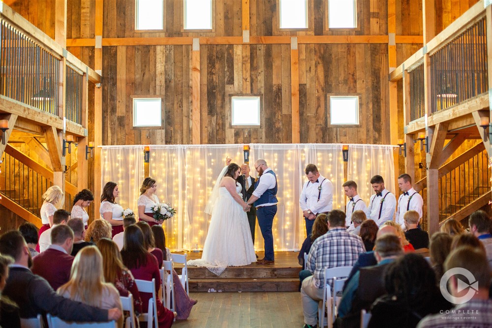 Inside wedding ceremony at the Gambrel Barn