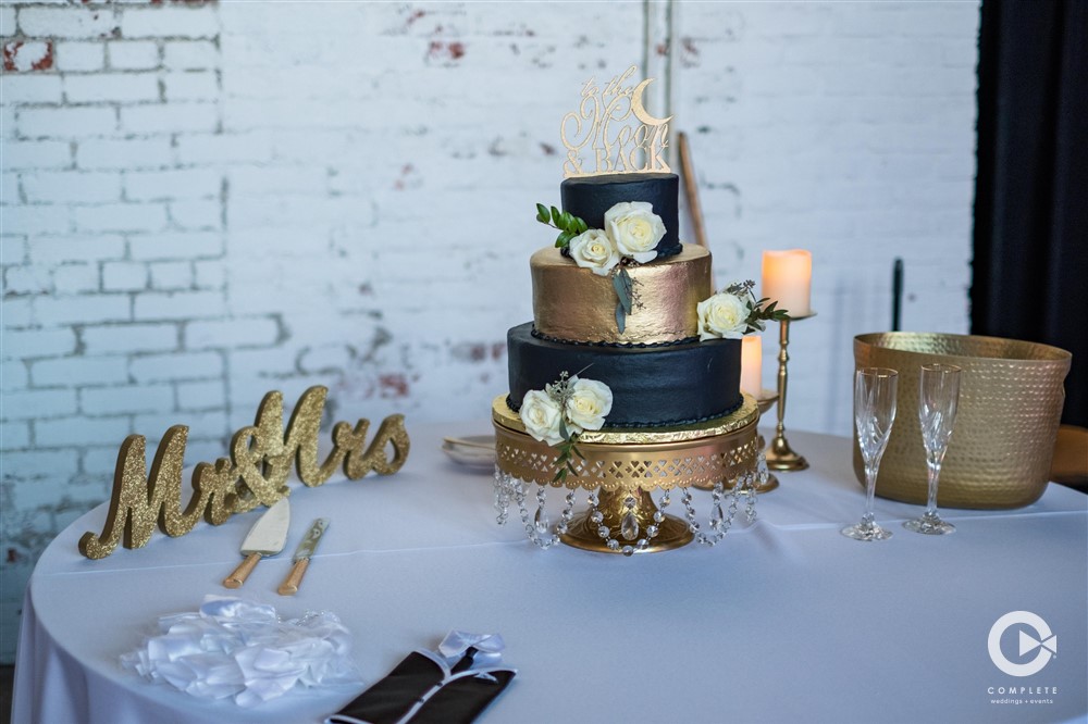 gold and navy wedding cake