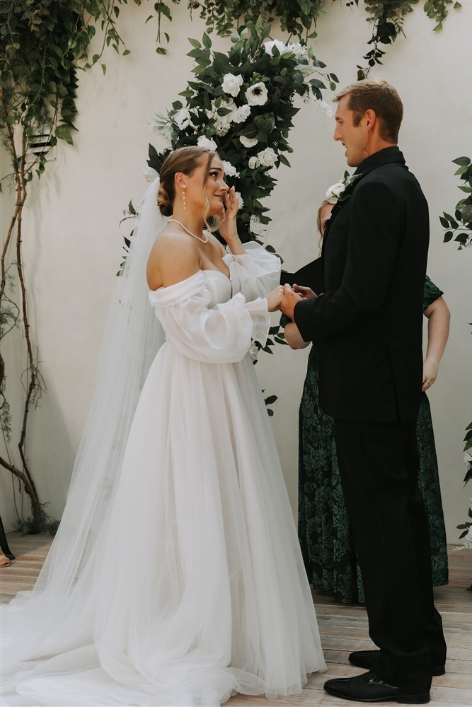 bride and groom at the altar