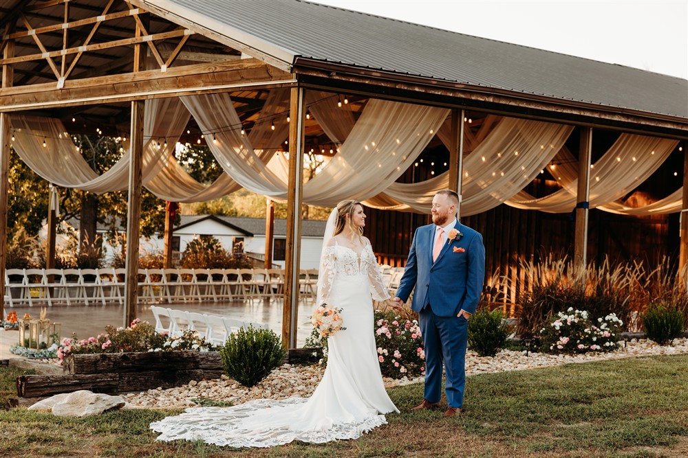 Bride and groom portraits at Spring Creek Estates in front of ceremony space