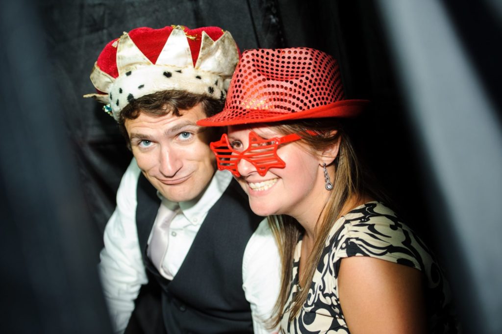 Guests taking picture in a photo booth