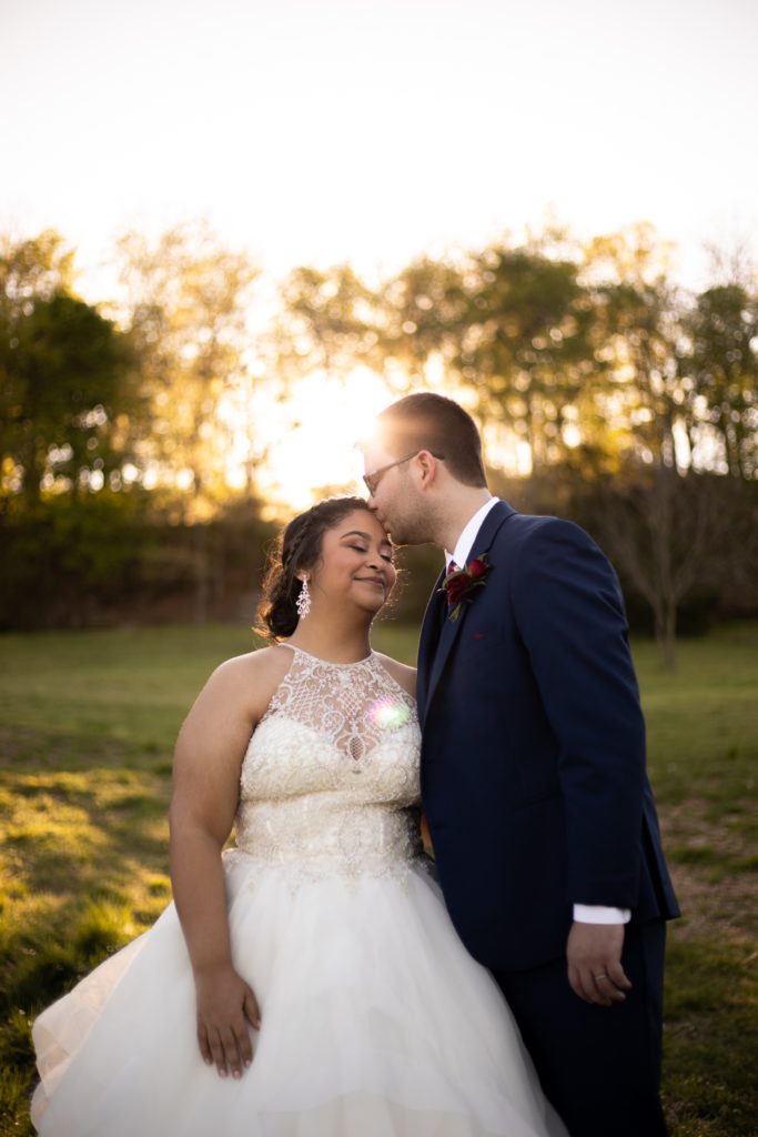 Outdoor golden hour wedding portrait