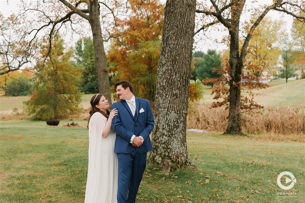 Stephanie + Andrew's Outdoor Missouri Wedding Ceremony Couple Portrait Outside in Missouri