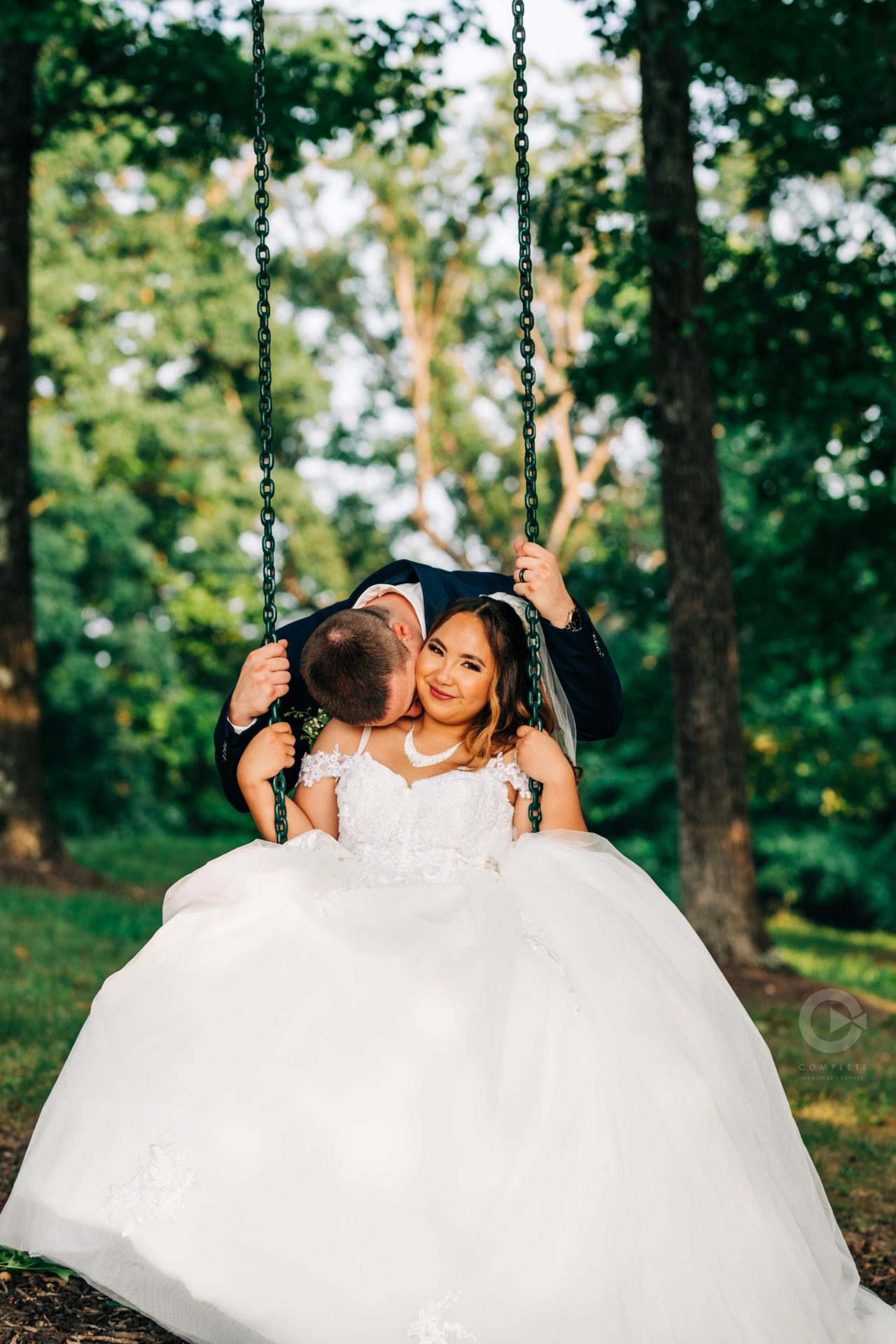 Bride & Groom Kiss on Cheek