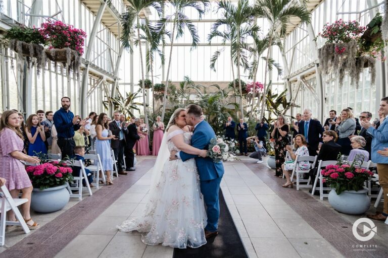 Complete Weddings + Events Photography, bride and groom kissing, wedding ceremony