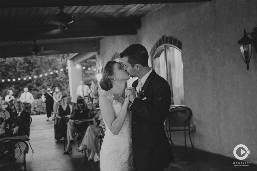 Wedding couple in St. Louis Missouri kissing black and white photo