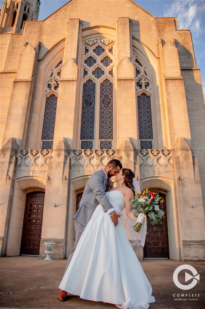 Bride and groom outside of ceremony space in St. Louis