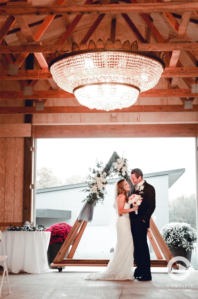 Bride & Groom at barn reception