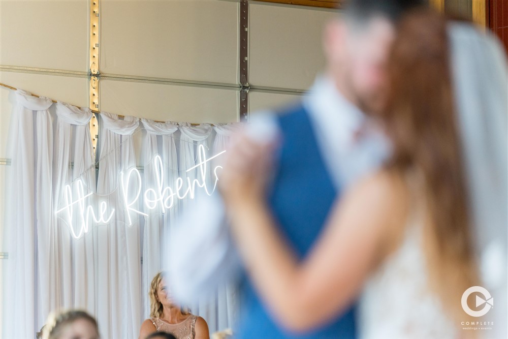 Complete Weddings + Events Photography, Bride, Groom, bride and groom dancing, first dance, neon sign
