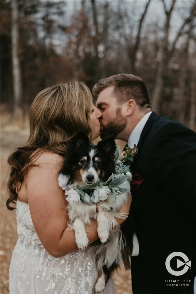 Complete Weddings + Events Photography, bride and groom wedding portraits, bride and groom kissing, bride and groom with their dog