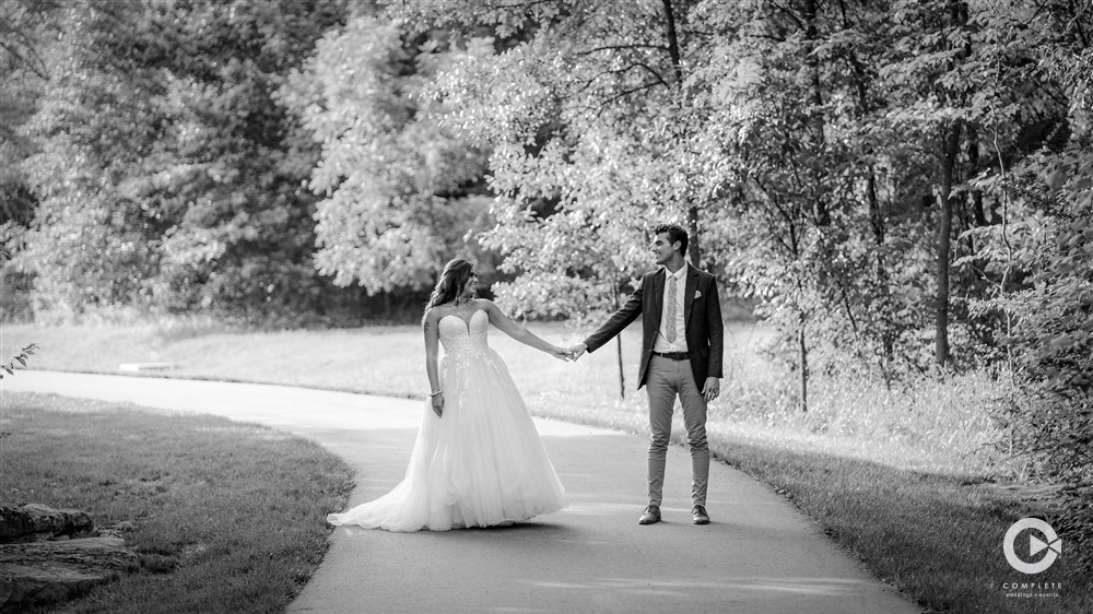 couple walking on wedding day, complete weddings and events photography