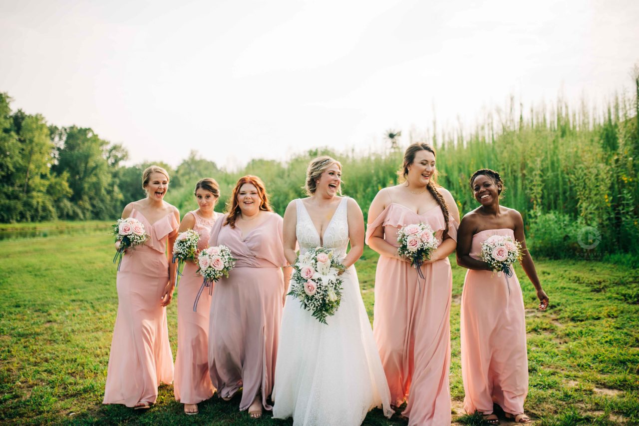 bride walking with bridesmaids, complete weddings + events photography, St. Louis wedding