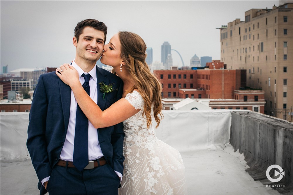 bride and groom kissing, complete weddings + events photography, St. Louis wedding