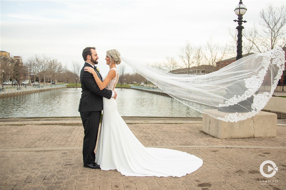 bride and groom windy veil