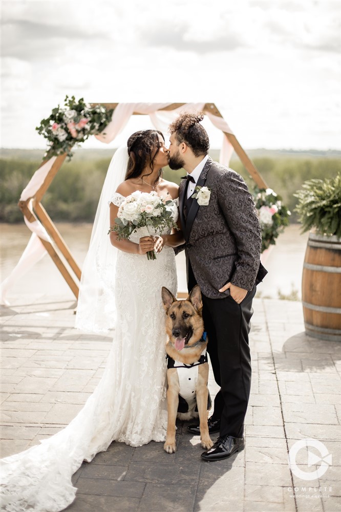 Complete Weddings + Events Photography, Bride, Groom, bride and groom kissing, bride and groom with dog