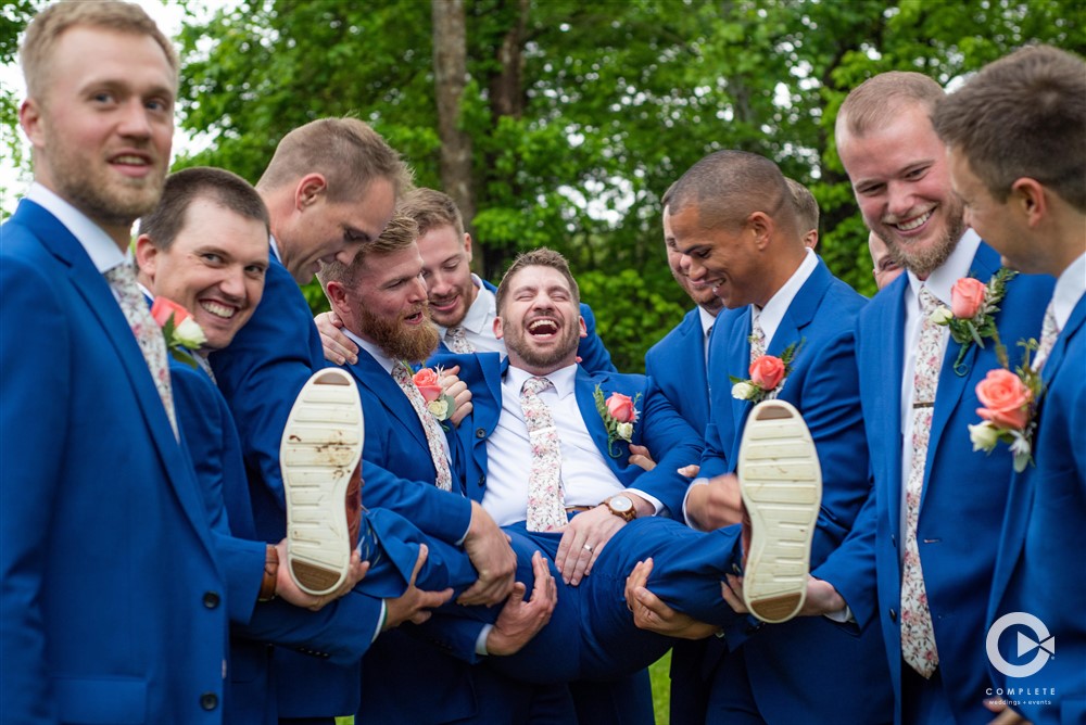 Complete Weddings + Events Photography, wedding party photos, groom laughing