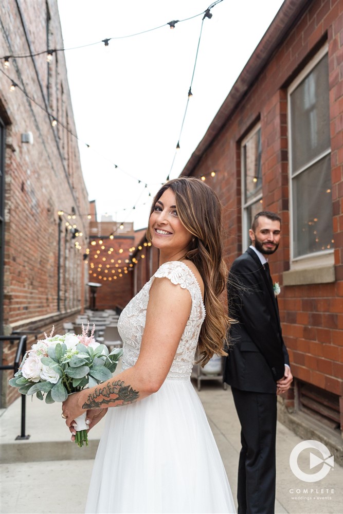 brick background wedding portrait