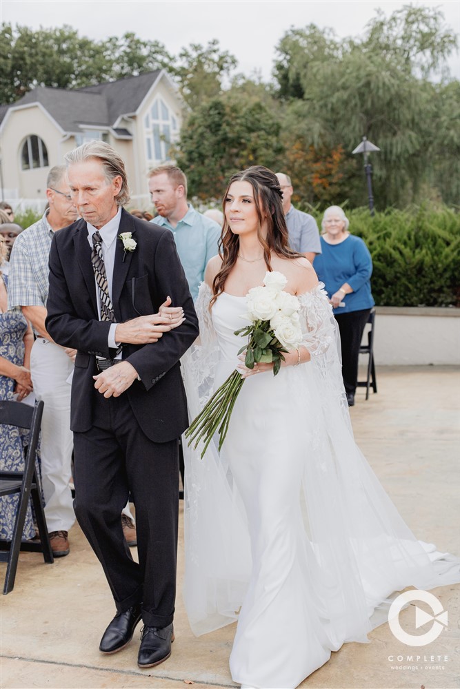 father walking bride down the aisle