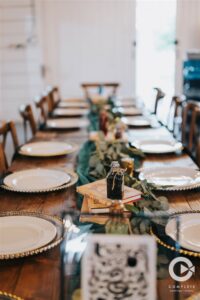 The Edison Barn Harry Potter wedding reception tables and details.