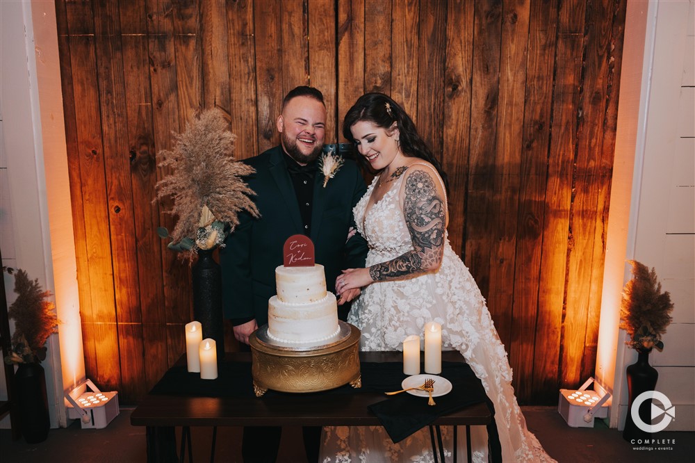 The Edison Barn Harry Potter wedding reception cake cutting.