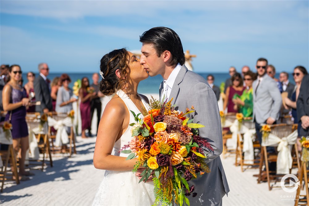St. Pete beach wedding kiss.