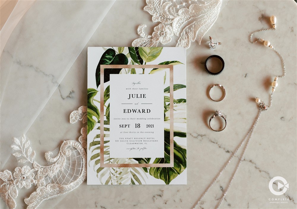 Clearwater, Florida glam tropical flat-lay wedding details.