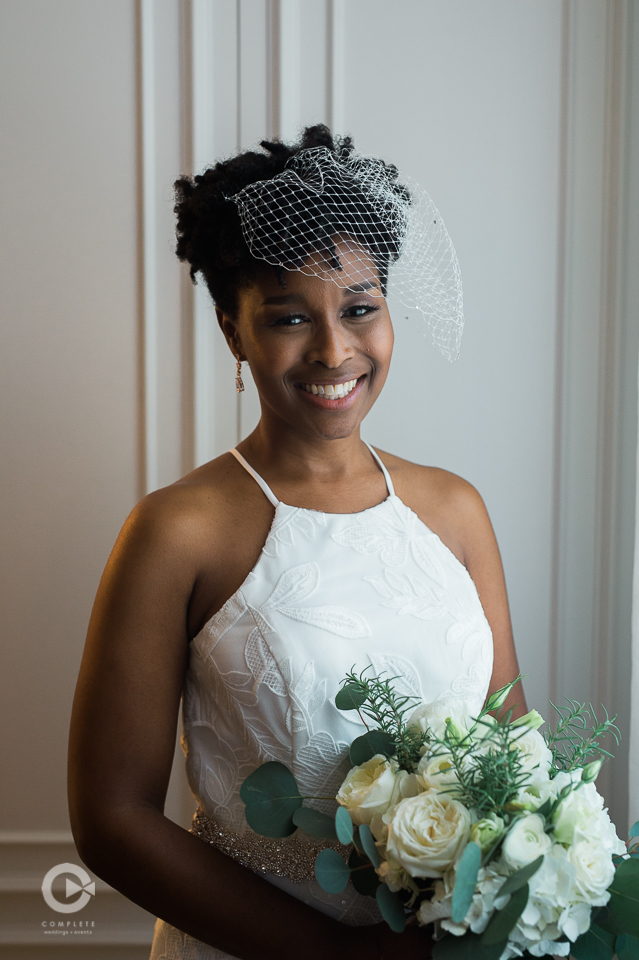 A beautiful bride with bouquet and veil