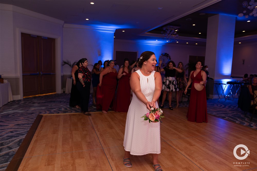 Bride getting ready for bouquet toss