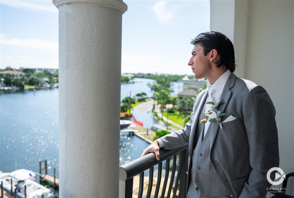 Hotel Zamora Rooftop Wedding in St. Pete Groom on balcony