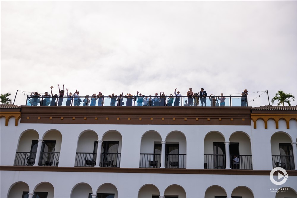 Entire Bridal party looks down from Roof at Hotel Zamora in St. Pete