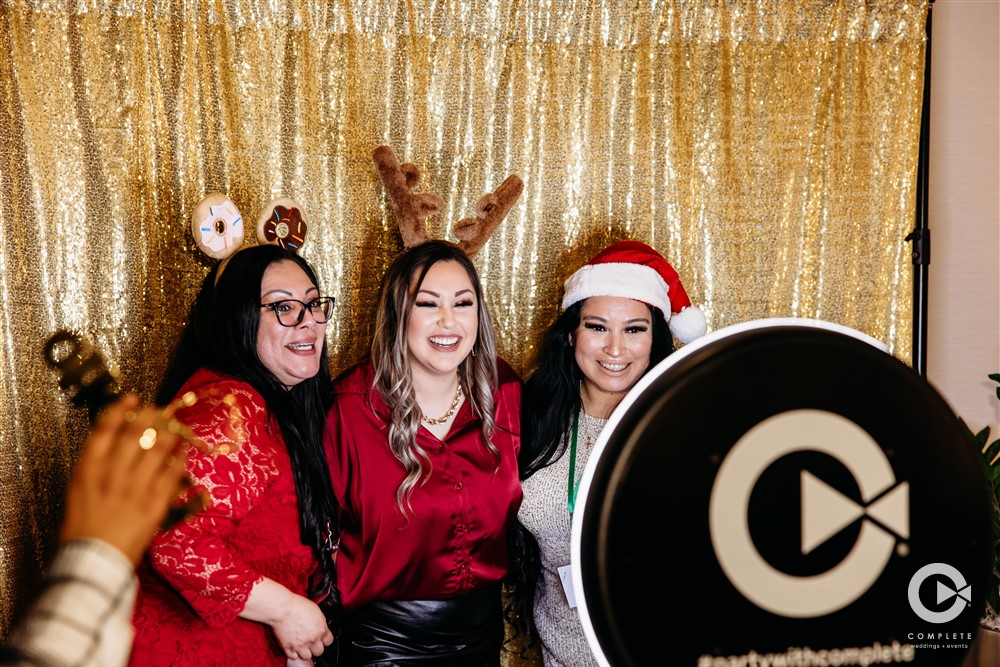 Guests having a fun time in a Tampa Photo Booth