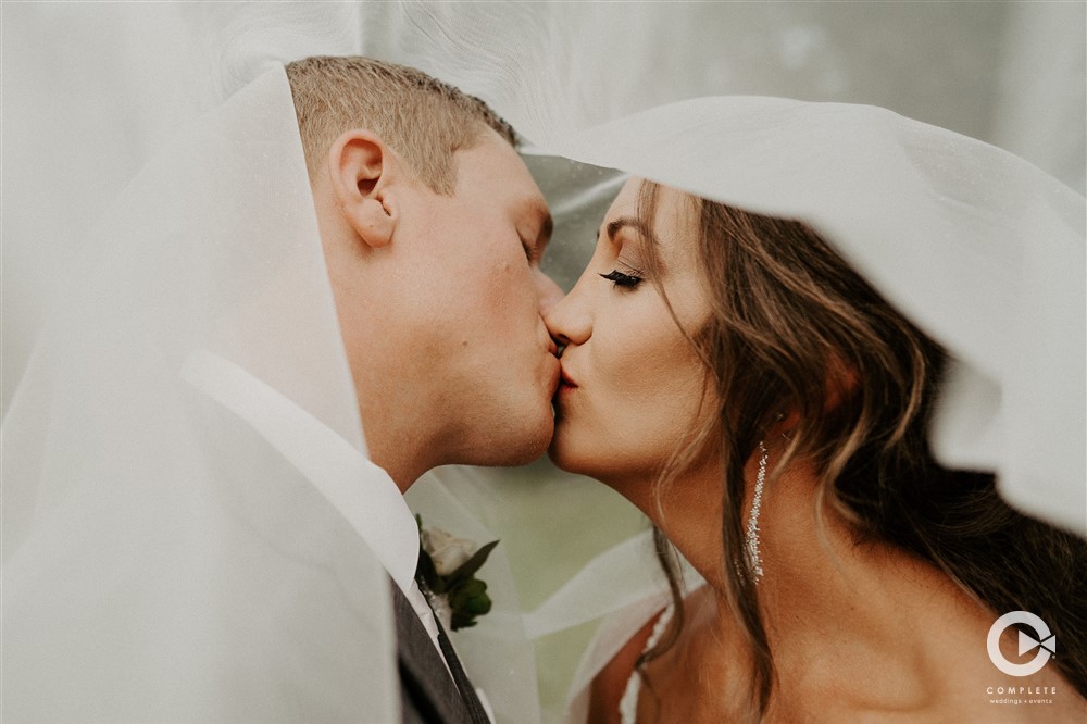 Bride and Groom under Veil The Springs