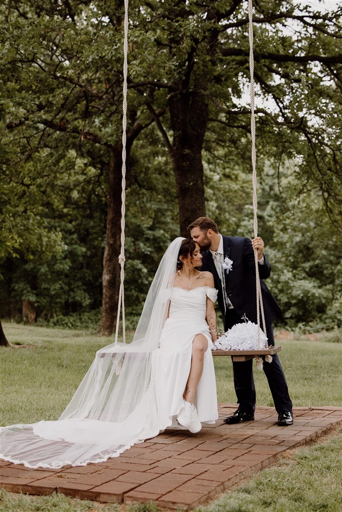 Couple on swing at the springs in Tulsa