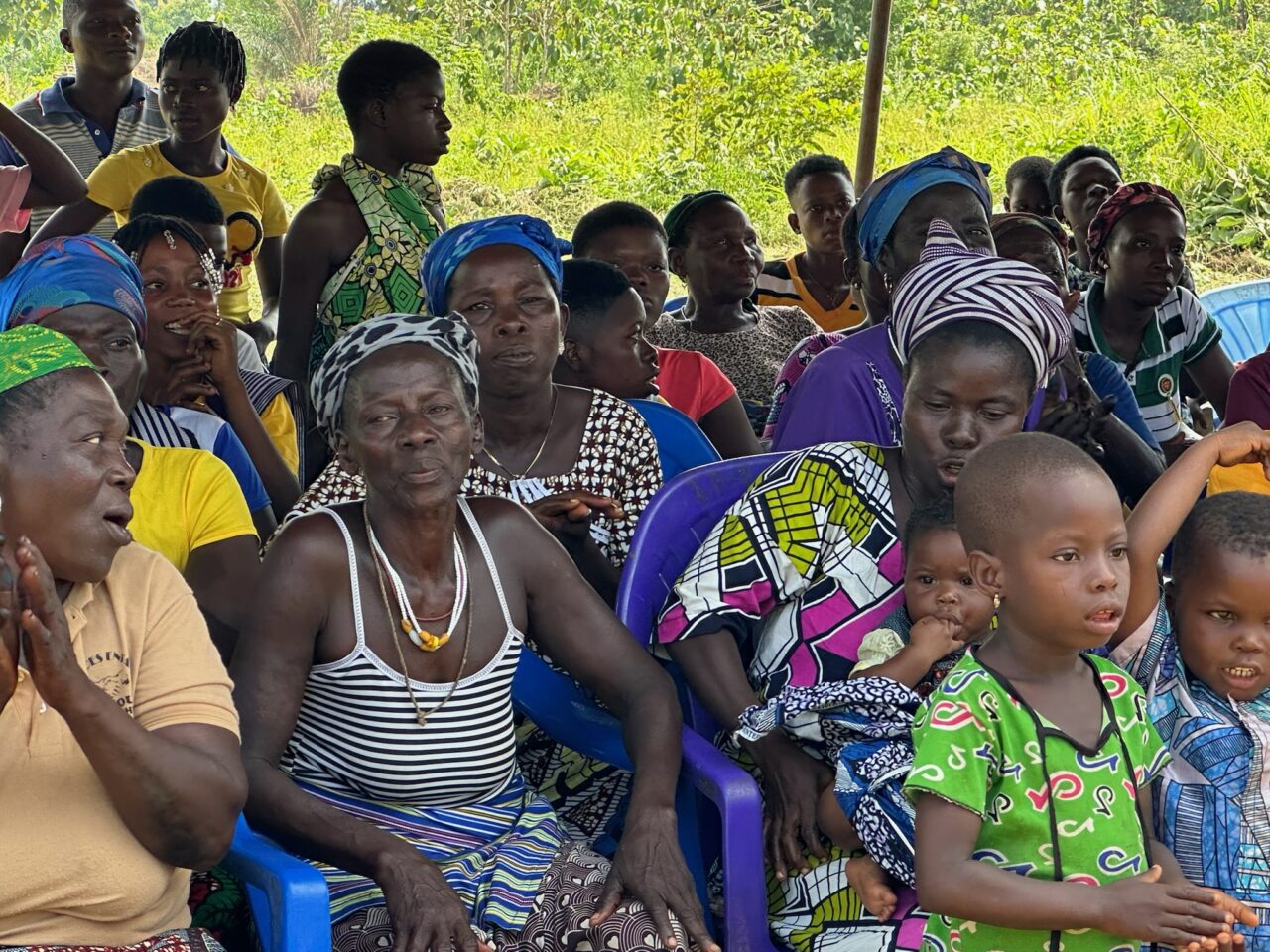 People sitting at celebration in Africa