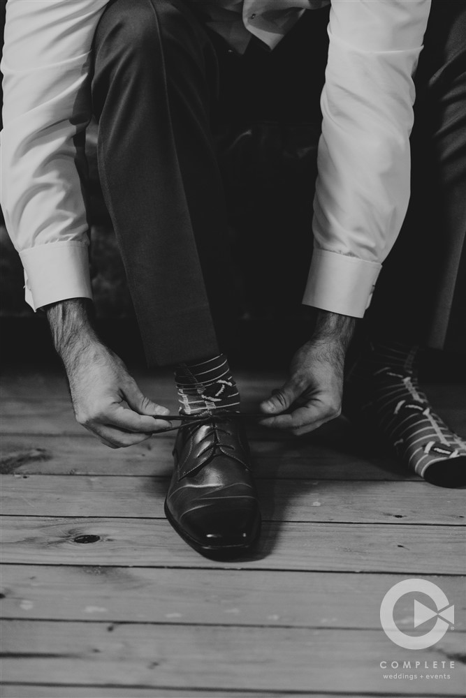 Groom shoes, getting ready
