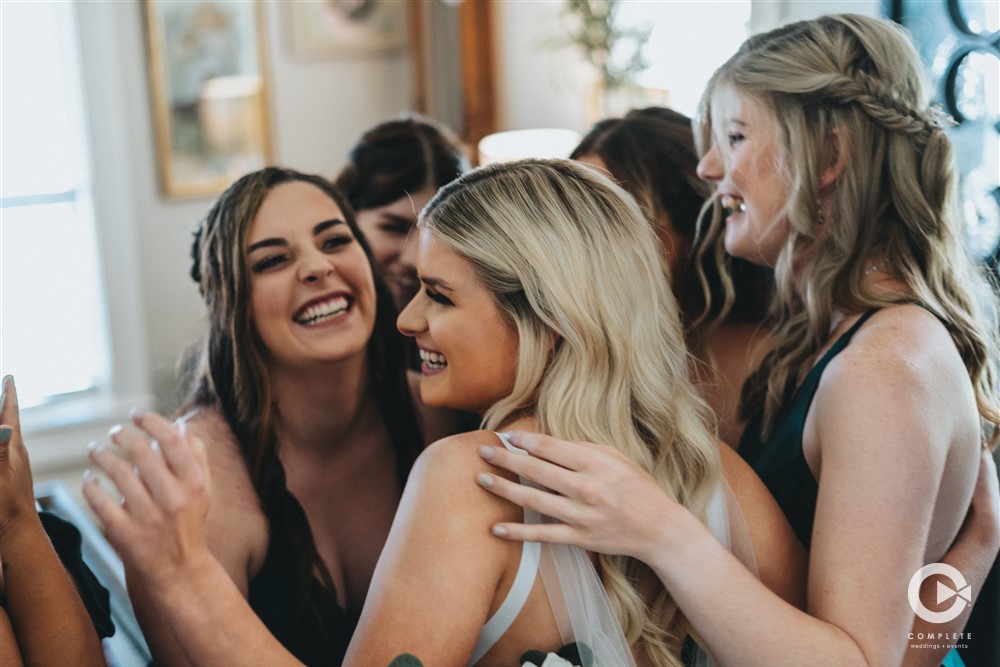 bridesmaids hug