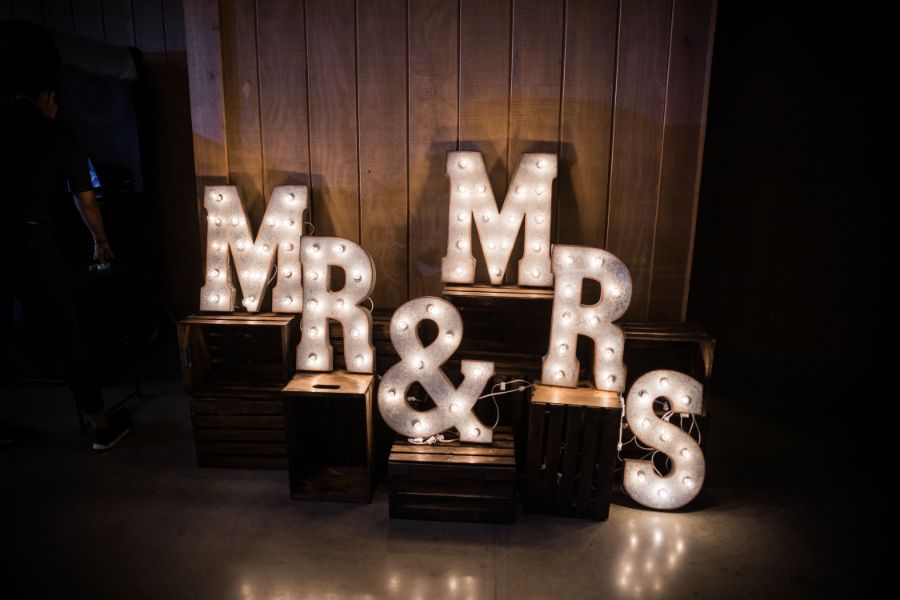 Gabi + Trae Mr & Mrs sign at the Stone Hill Barn Venue, Augusta KS.