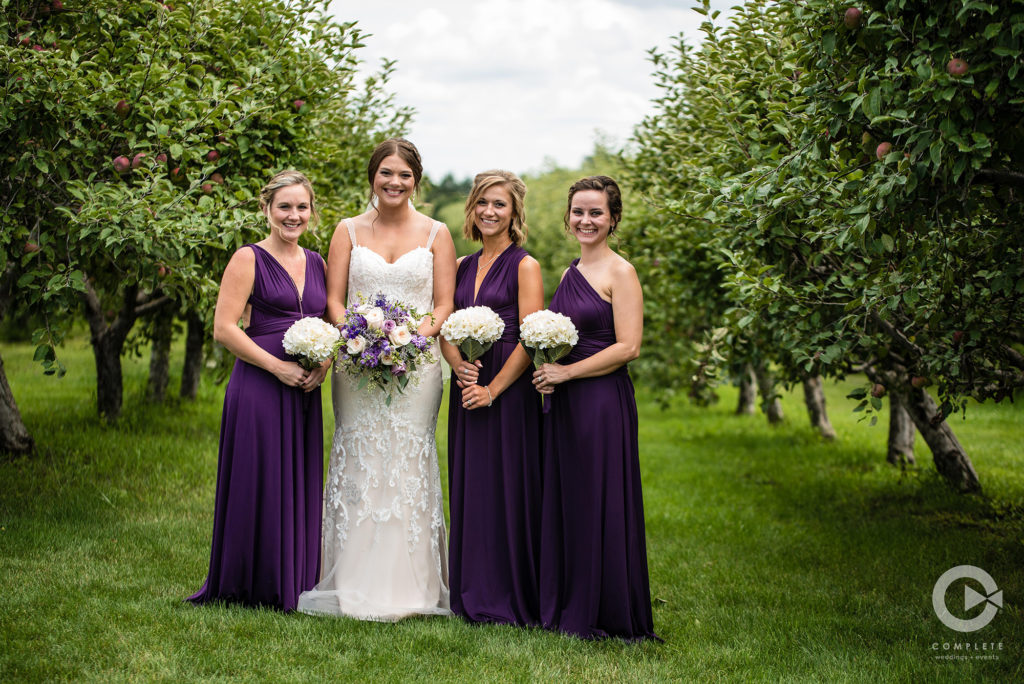 Bride and Bridesmaids in Purple Dresses