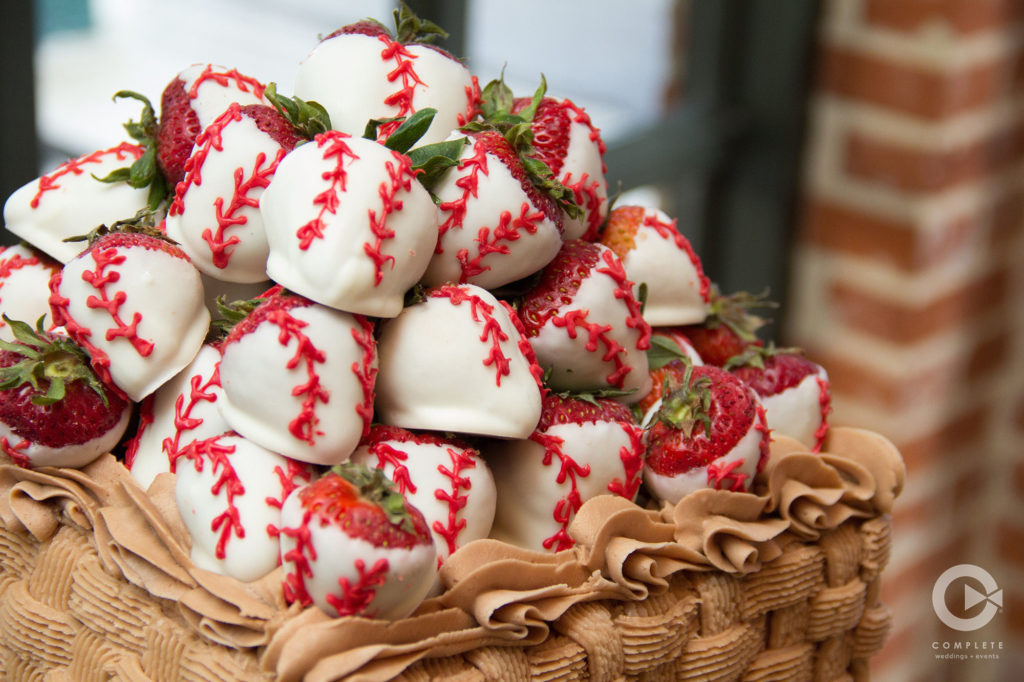 Strawberries decorated as baseballs