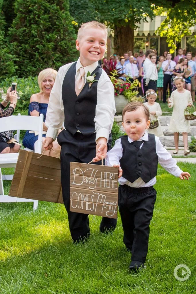 Two Ring Bearers with Sign