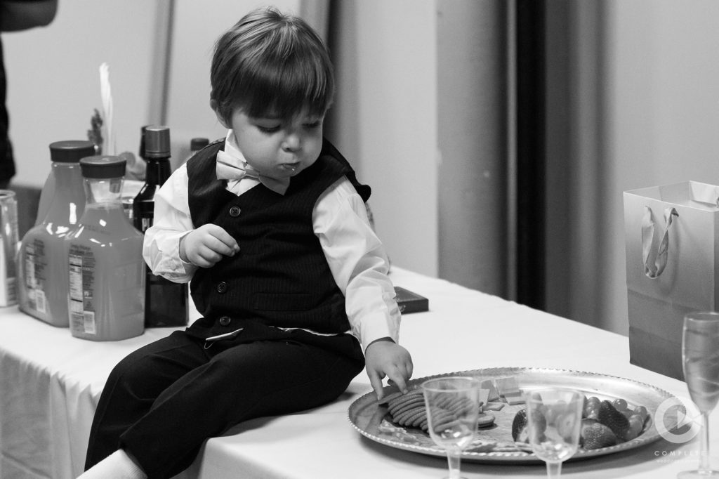 boy eating on Wedding Day
