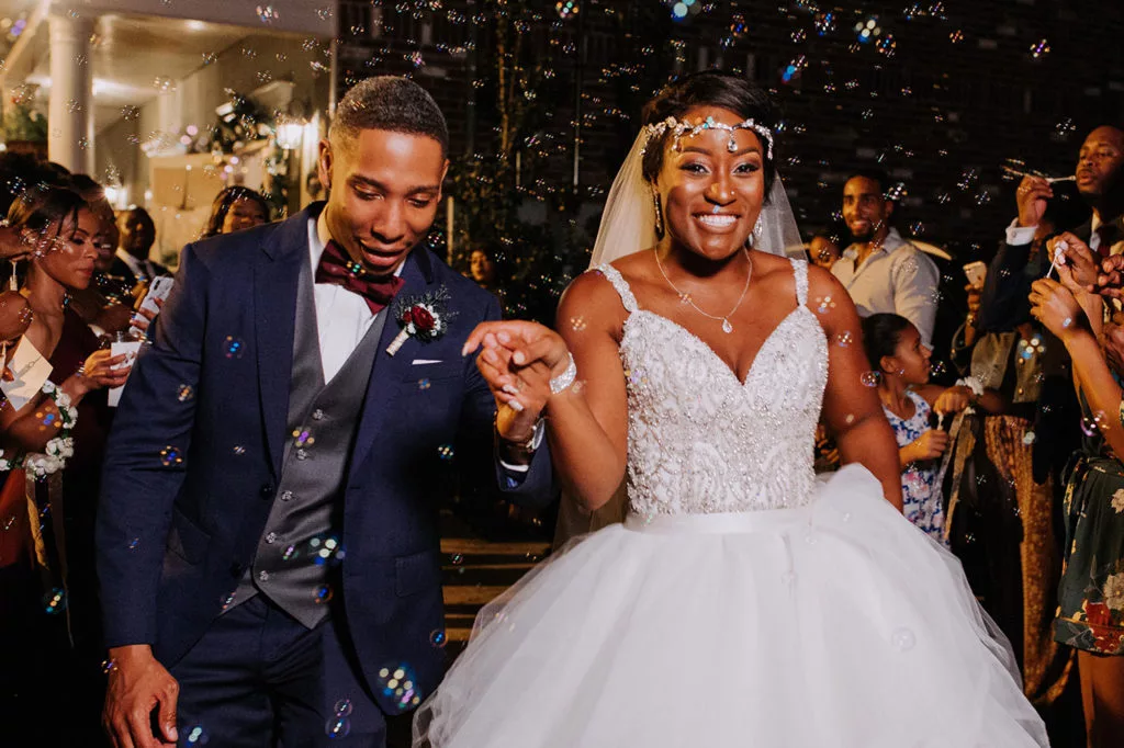 Event photography of African American couple Wedding Exit